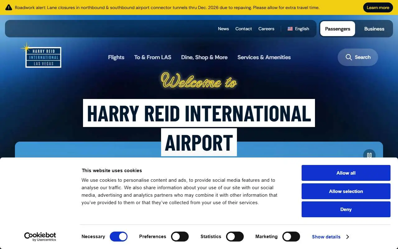 Tampilan website resmi Bandara Internasional Harry Reid (harryreidairport.com)