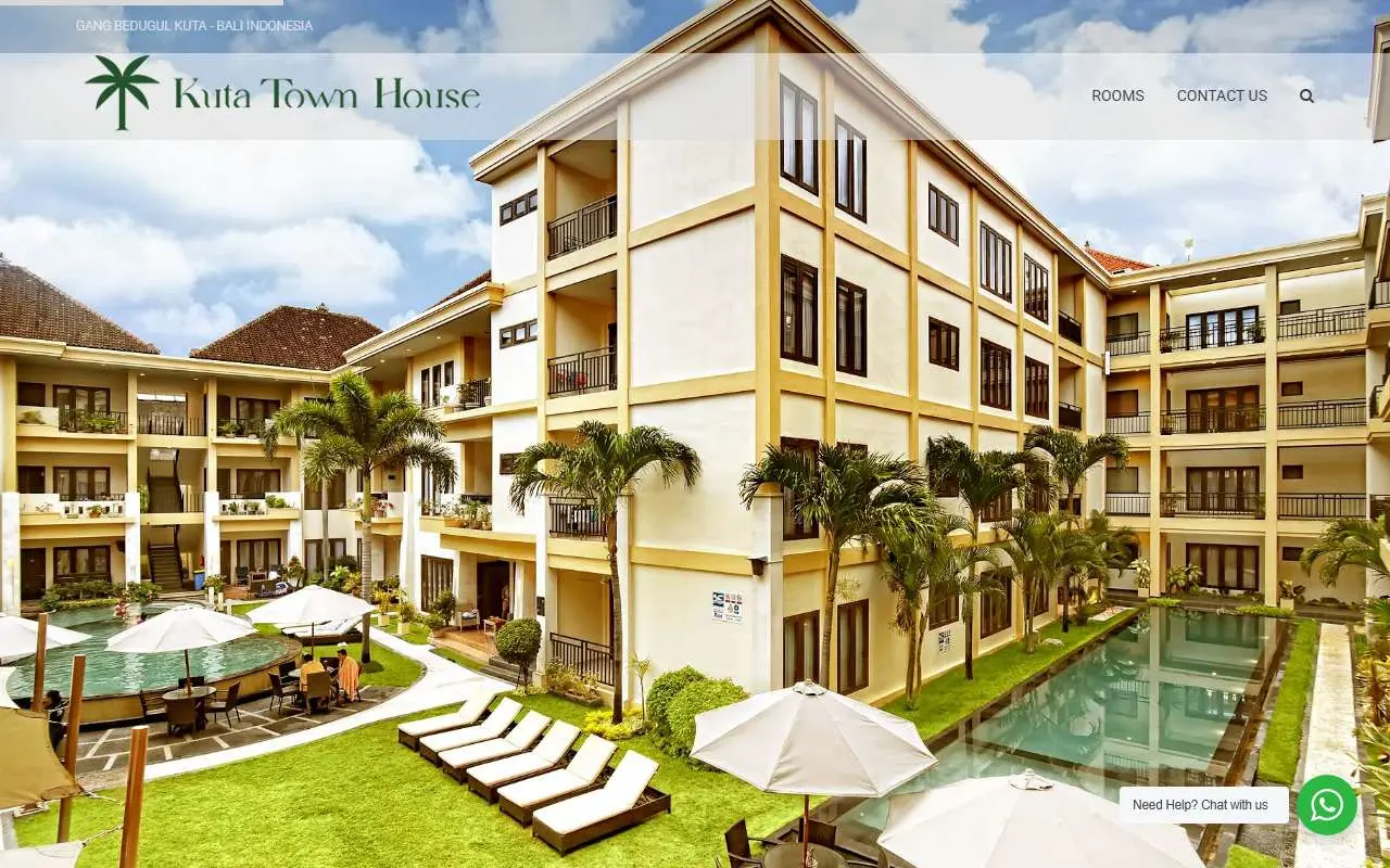 Tampilan website resmi Kuta Town House (kutatownhouses.com)