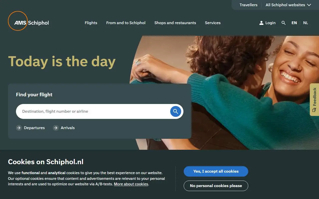 Tampilan website resmi Schiphol Airport (schiphol.nl)