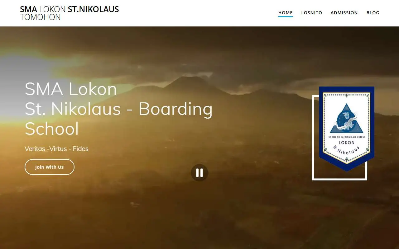 Tampilan website resmi SMA Lokon St Nikolaus Tomohon (smalokon.sch.id)
