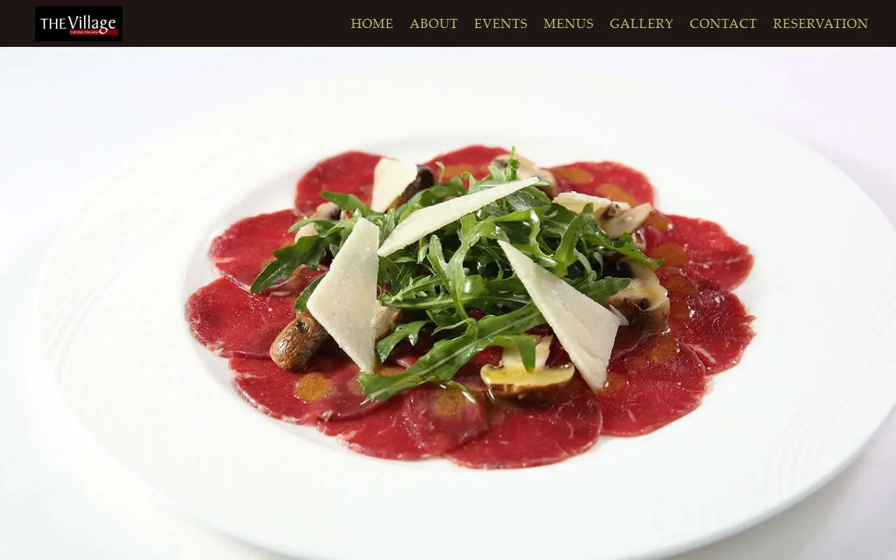 Tampilan website resmi The Village Cucina Italiana (thevillage-bali.com)